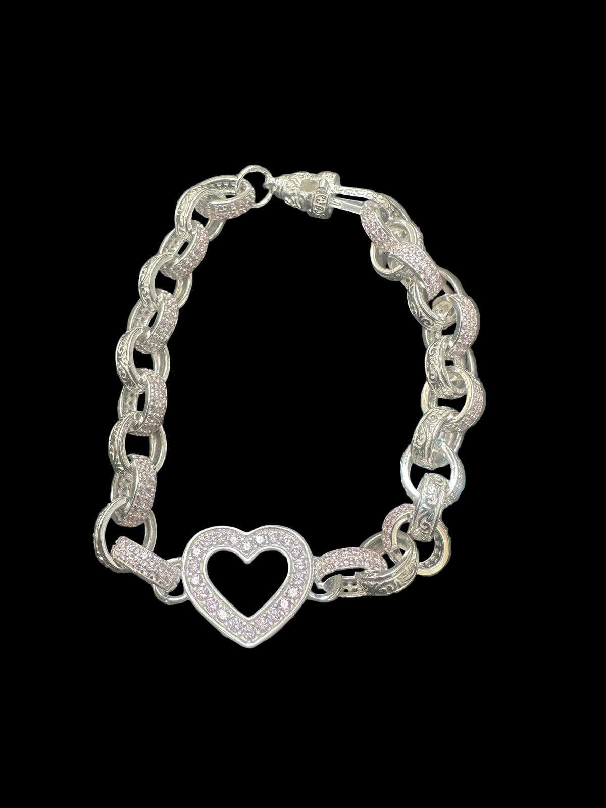 Sterling Silver Heart Link Bracelet featuring a pink CZ open heart design and intricate belcher links.