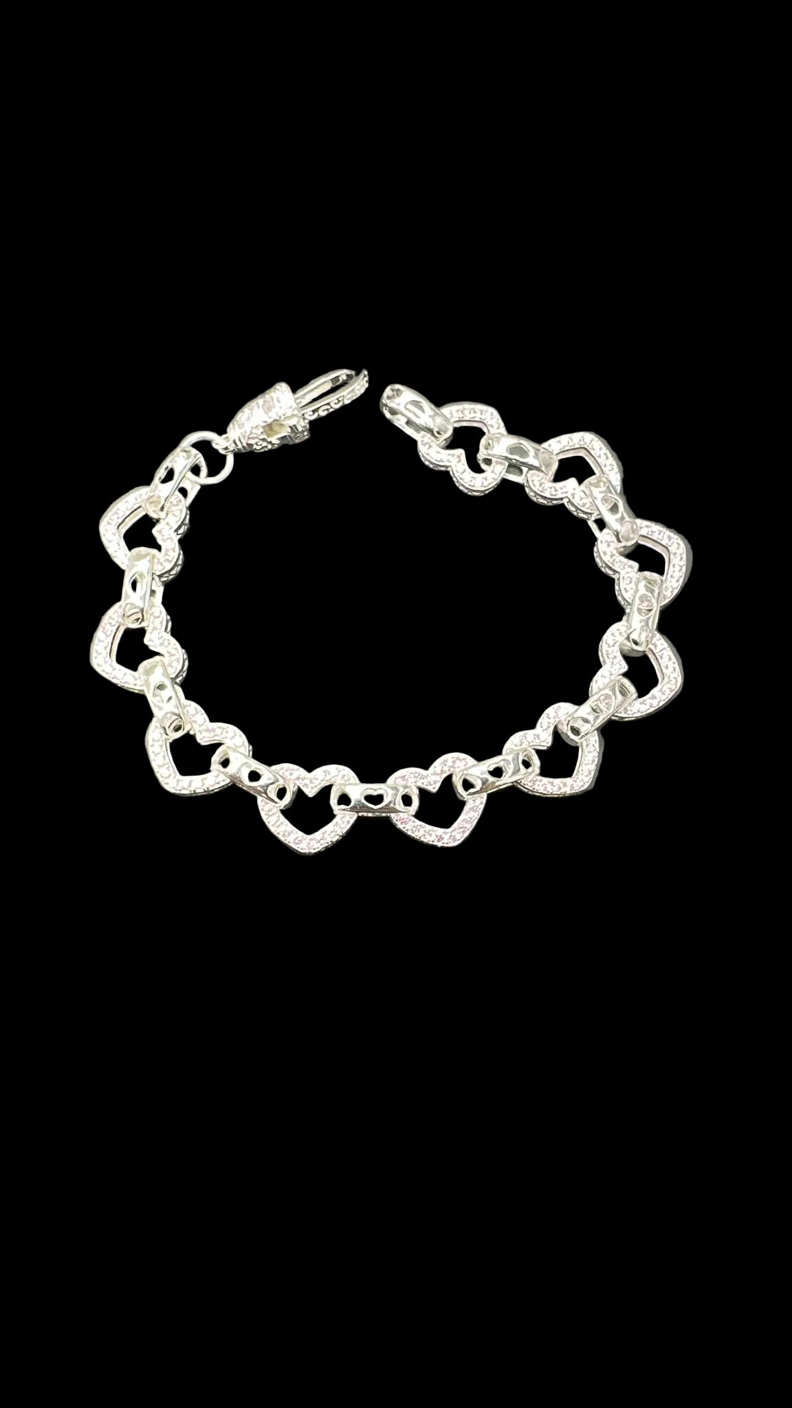 Sterling silver open heart bracelet with pink accents and heart-shaped links, 10MM and 8MM sizes.