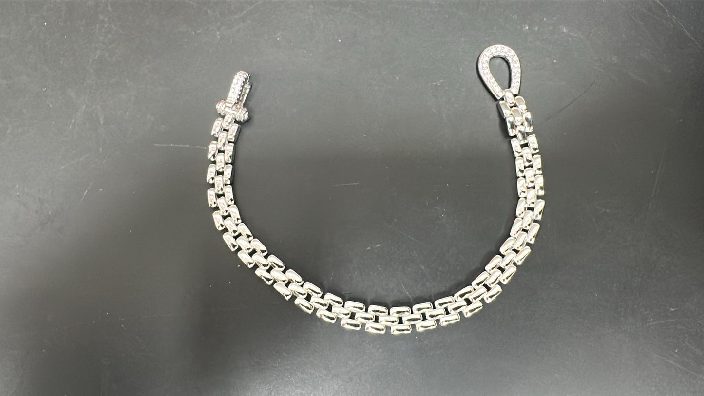 Sterling silver cz bracelet featuring a sleek chain design with sparkling CZ stones.