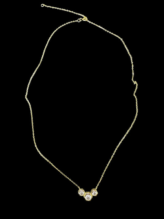 Sterling silver cz stone necklace with gold plated design and sparkling cz stones.
