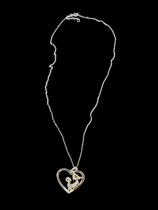 Sterling silver mother child necklace with heart design and chain, showcasing love and connection.