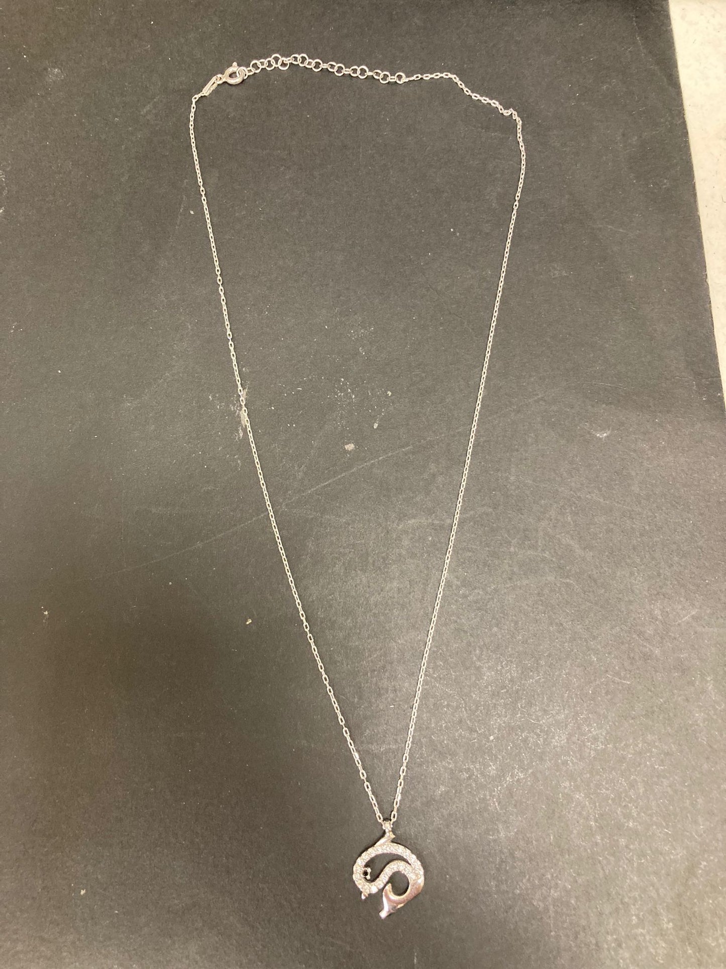 Sterling Silver Cz Dolphin Necklace NCZ9101 showcasing a dolphin design, perfect for ocean lovers. sterling silver dolphin necklace.