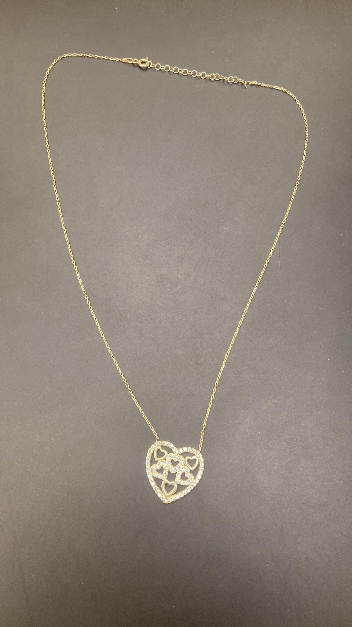 Sterling silver heart shaped necklace NCZ9122 showcasing a beautiful heart pendant with intricate design.