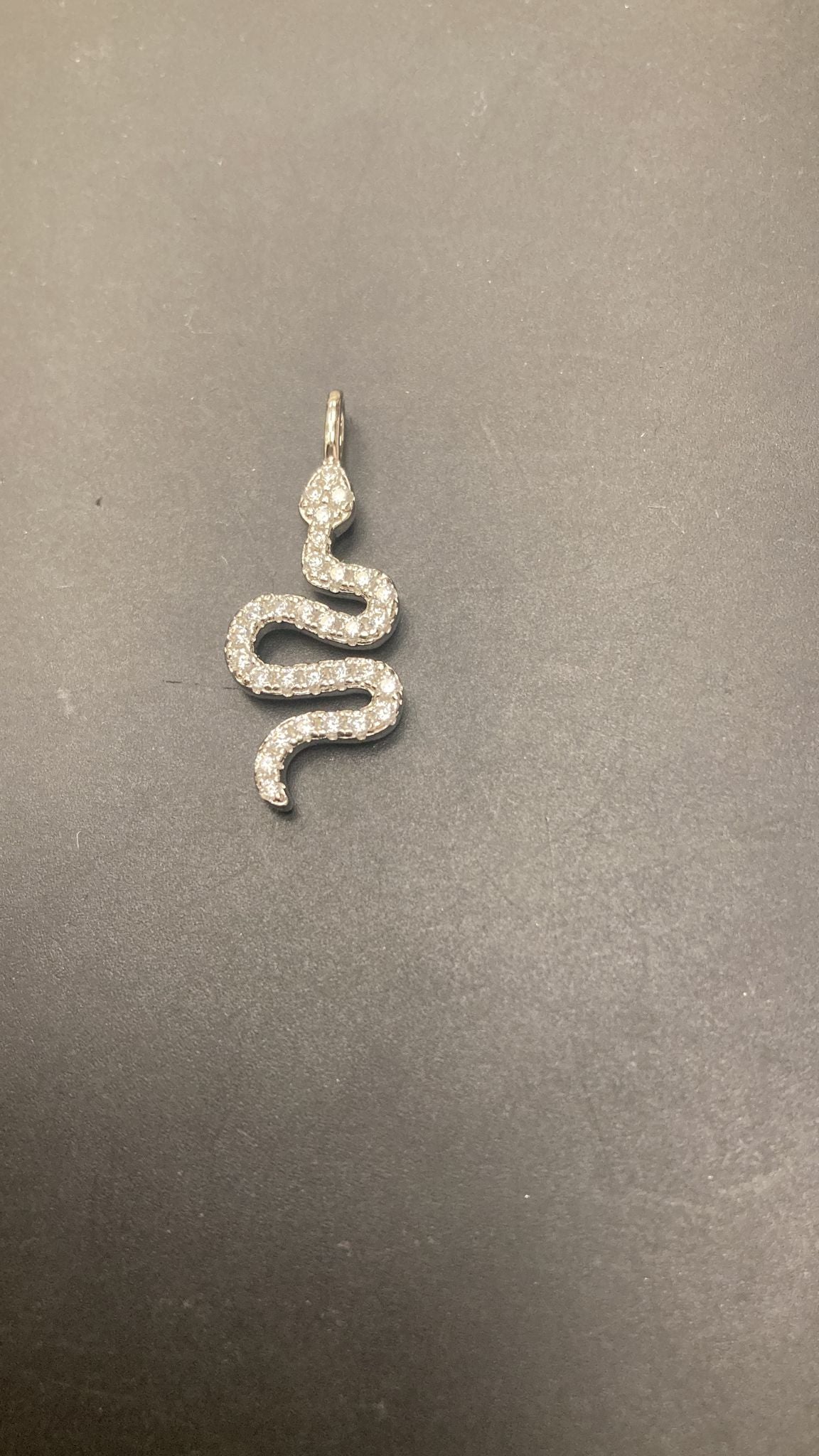Sterling Silver Cz Snake Pendant PCZ9854 showcasing a sparkling snake design in sterling silver.