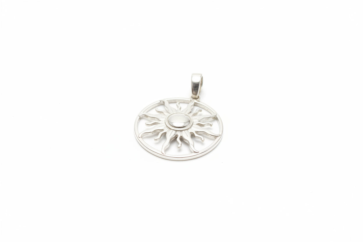 Sterling silver sun pendant featuring a detailed sun design with a central stone.