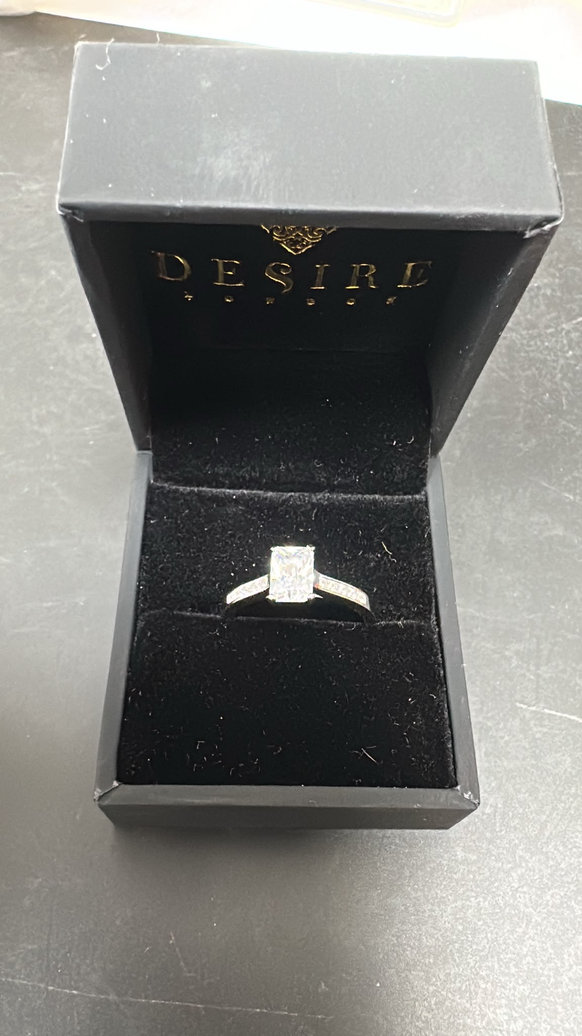 Sterling Silver Radiant Cut Ring Cz Stone RCZ2321 in black jewelry box, showing radiant cut sterling silver ring.