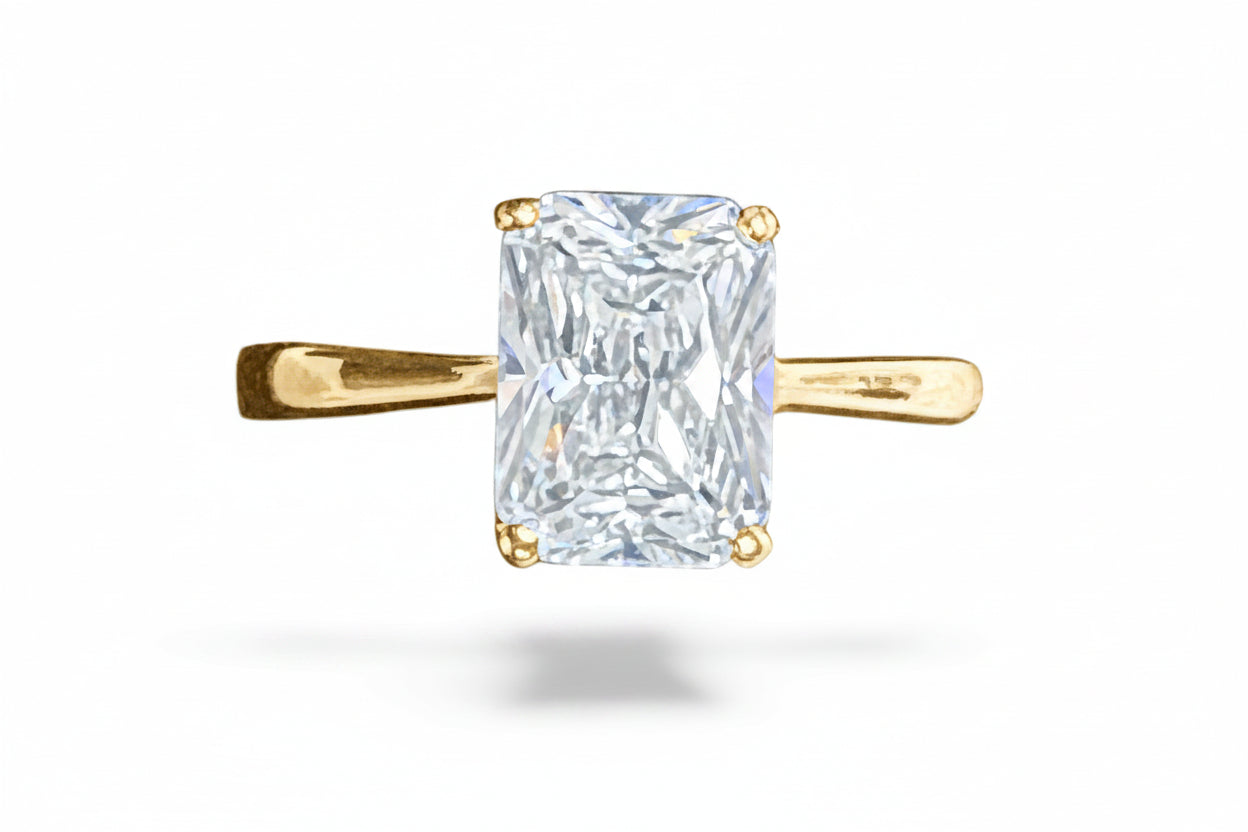 Sterling silver radiant ring with gold plated band and a 6x8mm CZ stone, elegant design for any occasion.