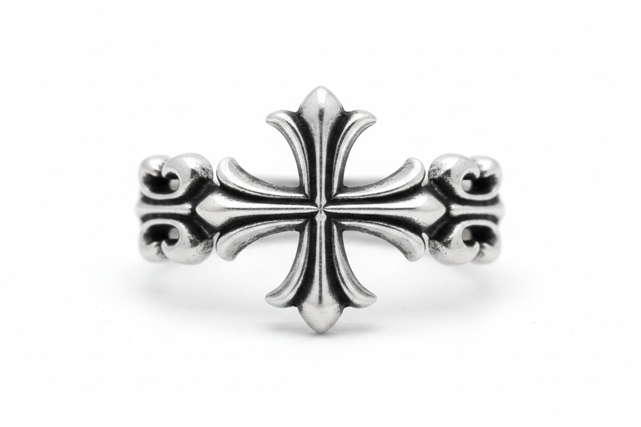 Sterling silver cross ring featuring an ornate design, measuring 9 x 20 mm.