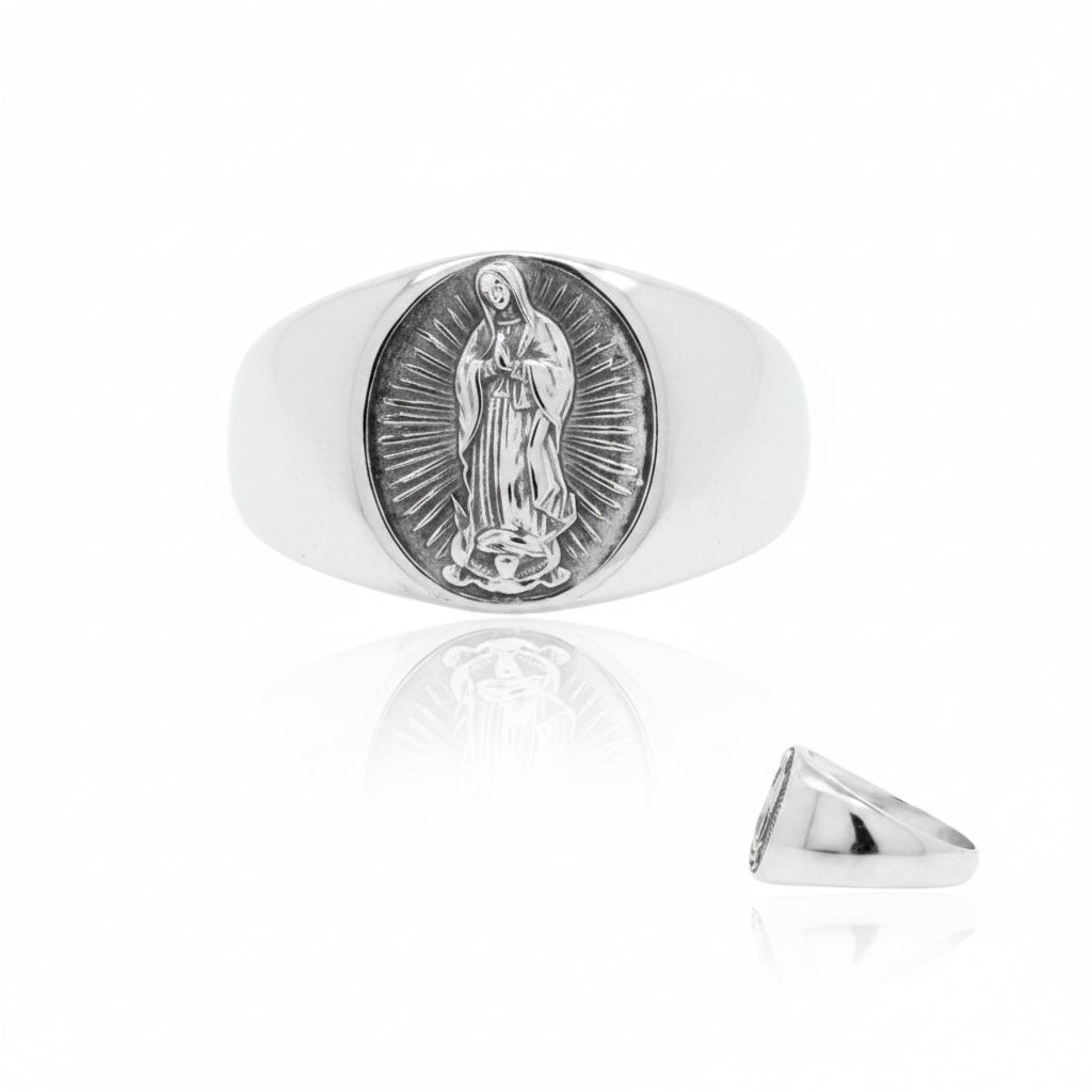 Our Lady of Guadalupe sterling silver ring featuring a detailed engraving of Our Lady against a polished band.