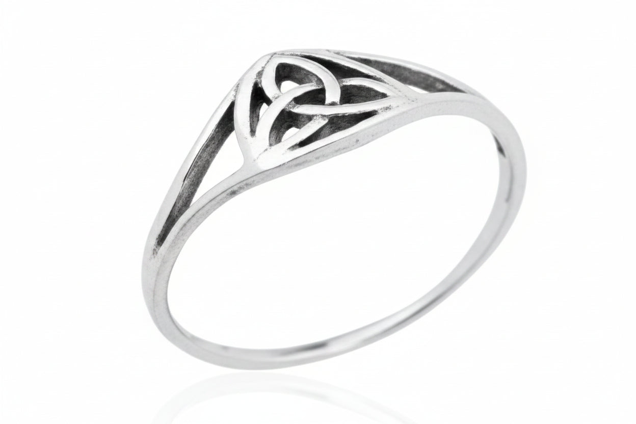 Celtic silver ring 8mm featuring intricate knot design in polished sterling silver.