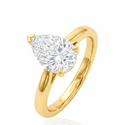 Sterling Silver Pear Cut Ring CZ Stone RCZ2340 with gold plated finish and 7*10MM center stone.