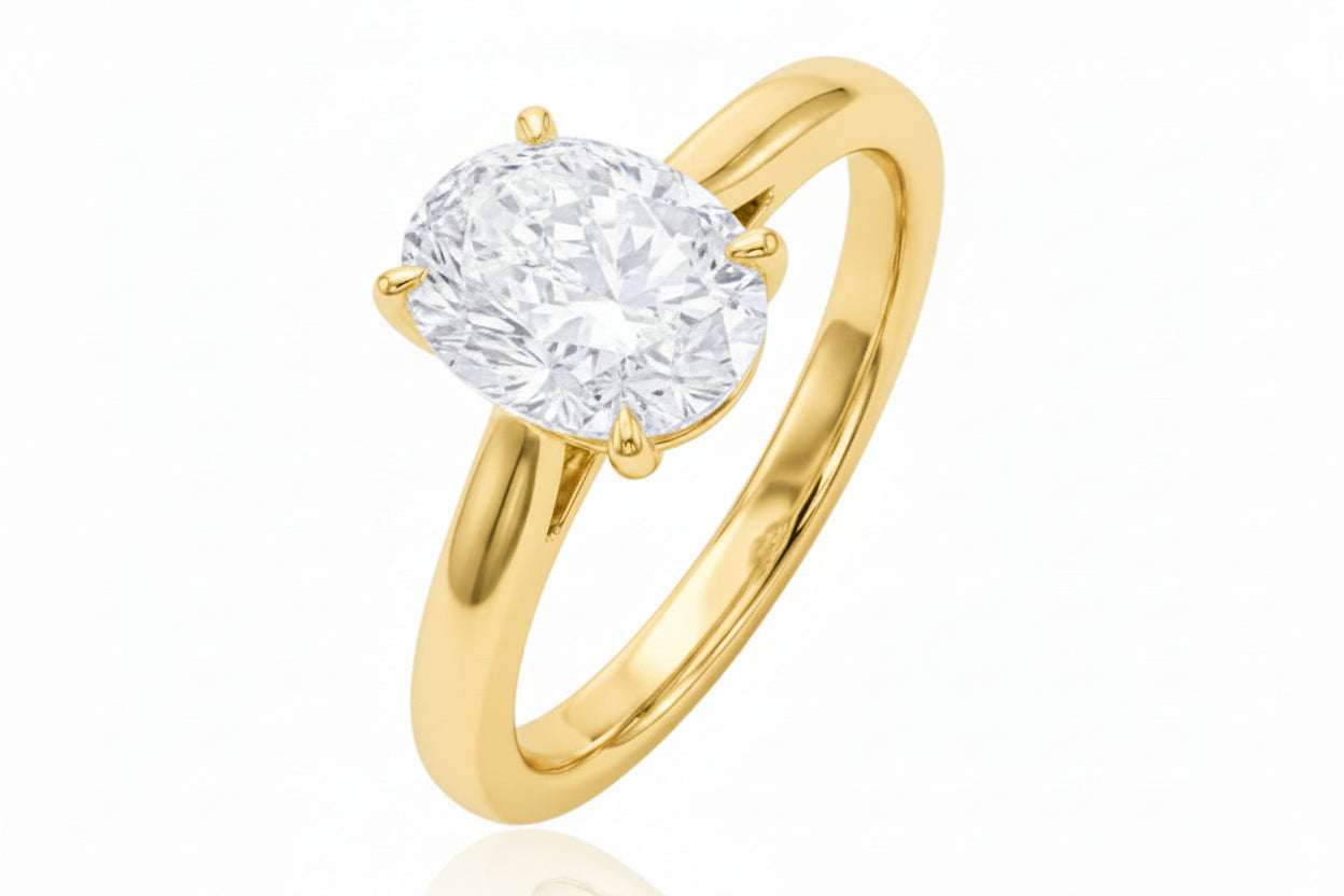 oval sterling silver ring with CZ stone, featuring a stunning gold plated design with a central CZ stone.