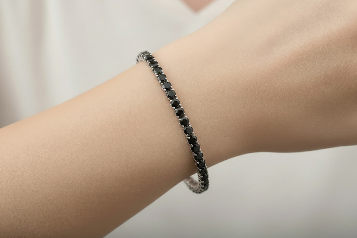 Silver tennis bracelet with black stones