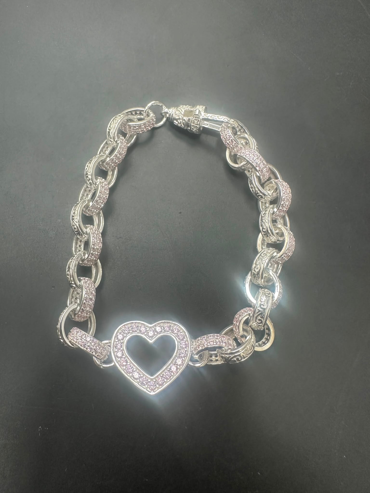 Sterling Silver Heart Link Bracelet featuring a pink CZ open heart design and intricate belcher links.