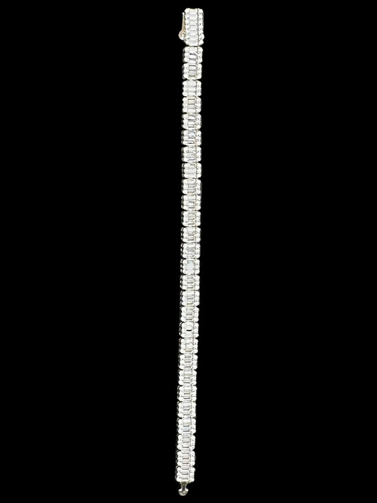 Sterling Silver Cz Iced Baguette Tennis Bracelet showcasing a stunning design, perfect for any occasion. silver baguette tennis bracelet.