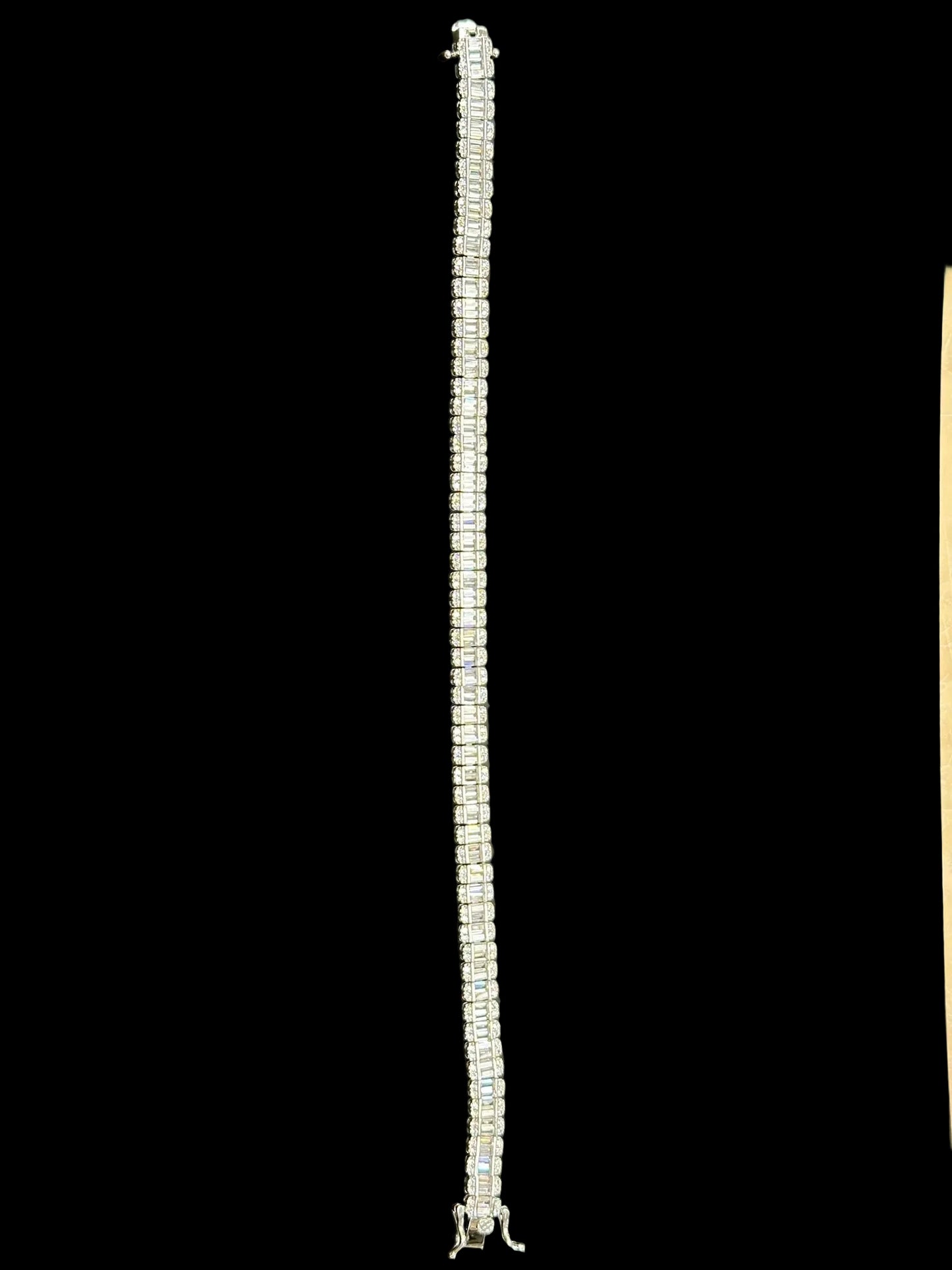 Sterling Silver Cz Iced Out Baguette Tennis Bracelet BRCZ026 showcasing a sparkling design.