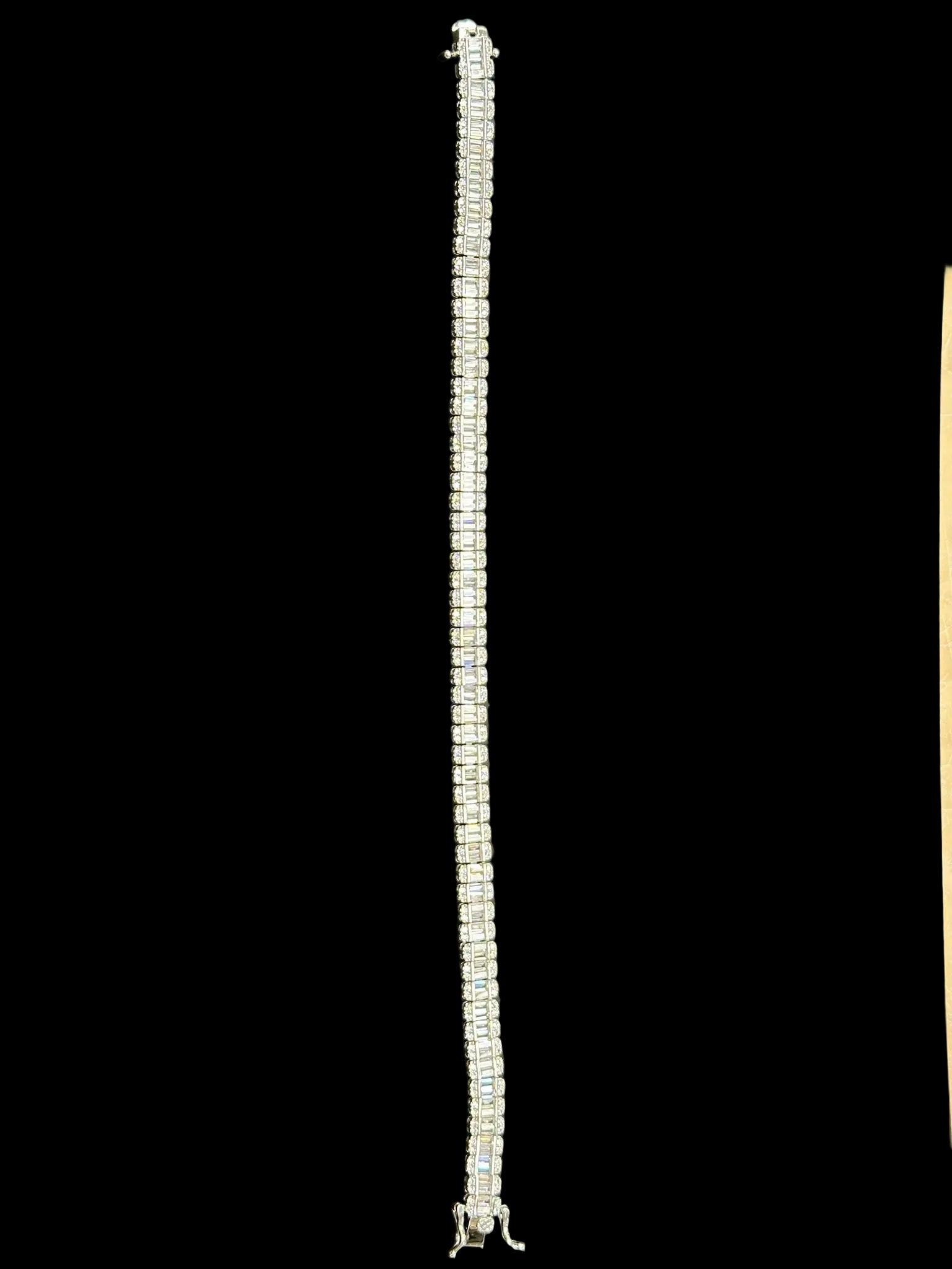 Sterling Silver Cz Iced Out Baguette Tennis Bracelet BRCZ026 showcasing a sparkling design.