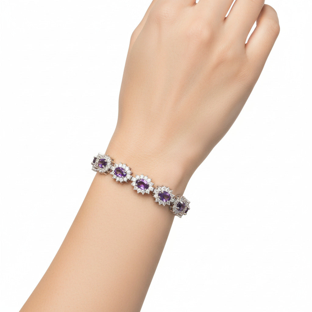 Silver bracelet with purple gemstones on a 