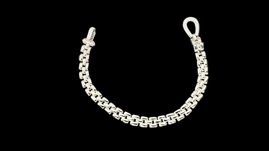 Sterling silver cz bracelet featuring a sleek chain design with sparkling CZ stones.