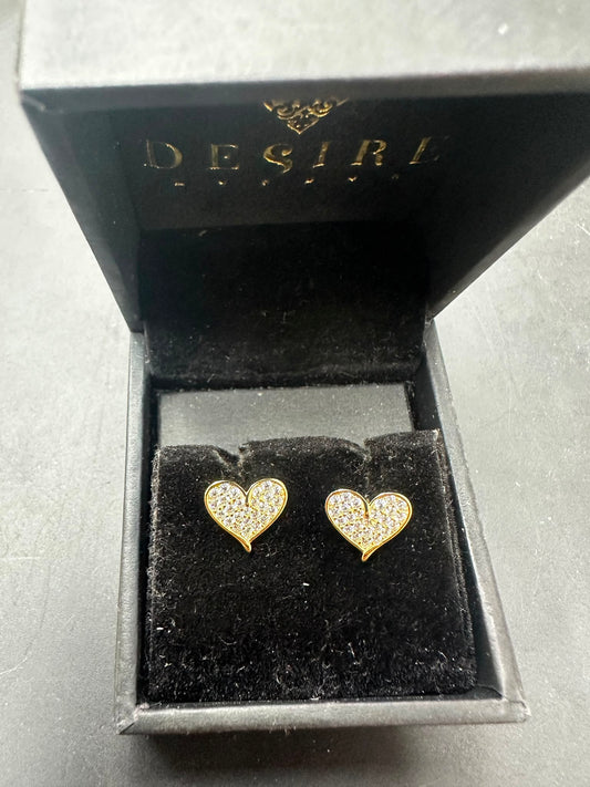 Sterling silver heart cz earrings in a stylish black box with gold detailing.