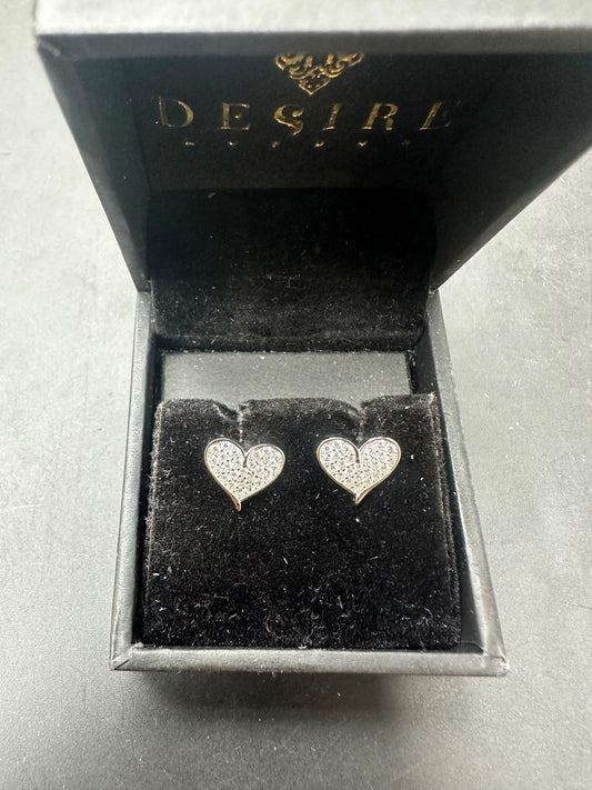 Sterling silver heart cz earrings displayed in a velvet black box with the word 'Desire' visible.