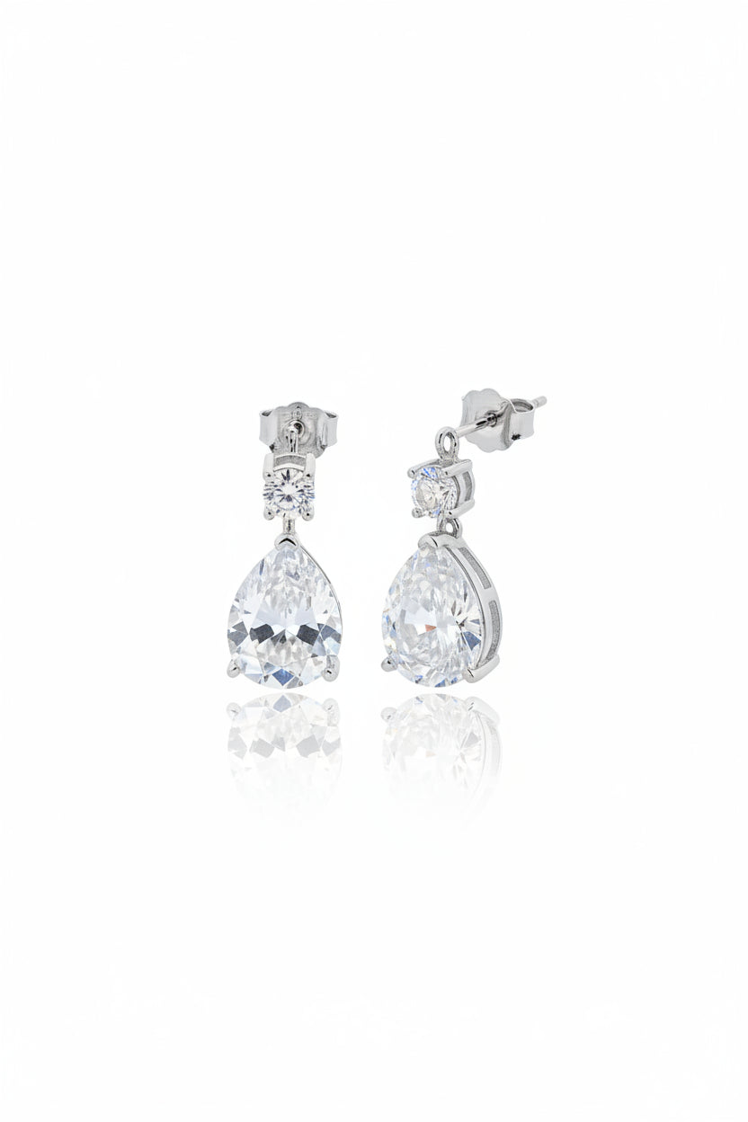 Sterling silver pear drop earrings featuring cz stones, round shape and pear-shaped design, color silver, elegant accessory.