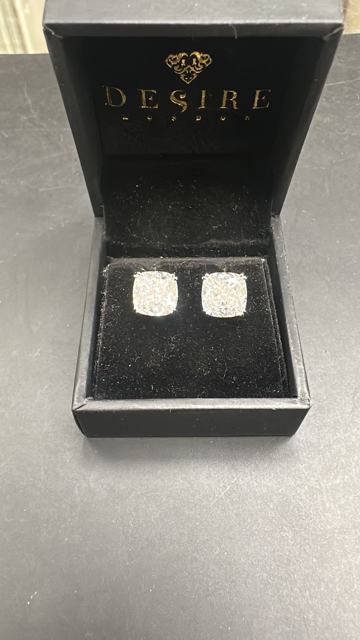 Sterling Silver Cz Cushion-Cut Stud ECZA806 in black jewelry box, showcasing cushion-cut cz stud earrings.