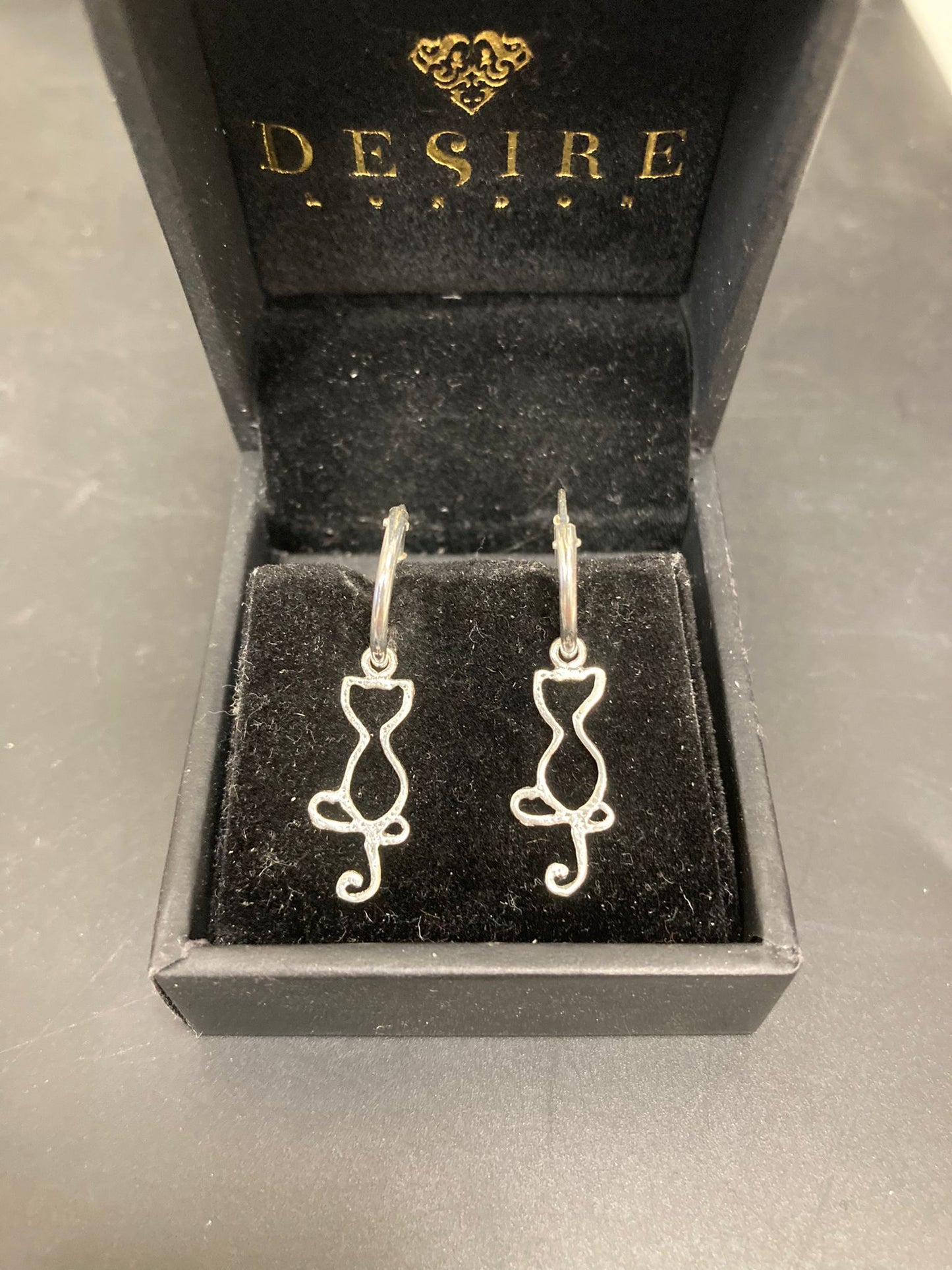 Sterling Silver Cat Drop Earrings EP0013 displayed in a jewelry box, showcasing sterling silver cat earrings design.