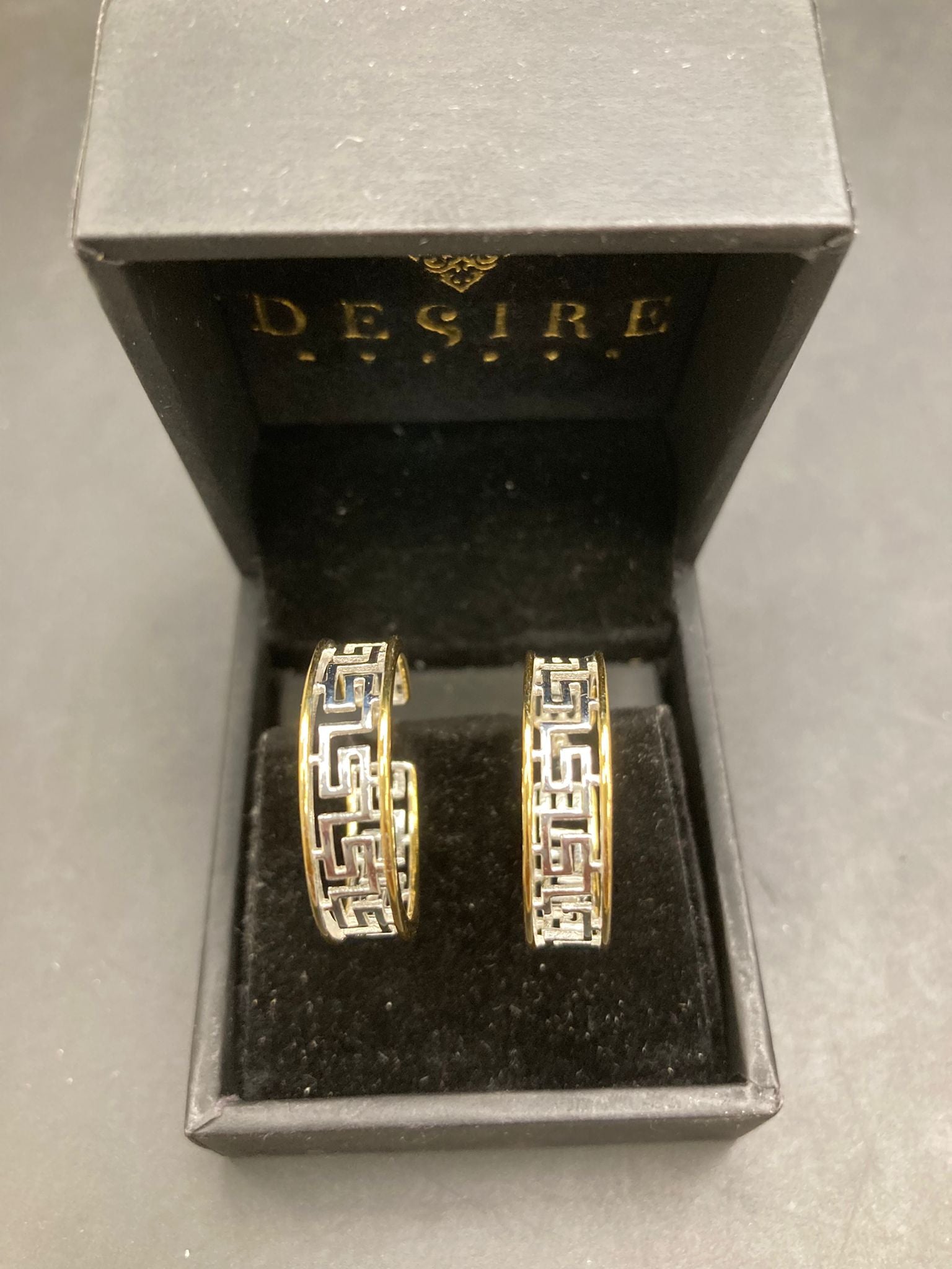 Sterling Silver Greek Key Earrings EP100112 displayed in a Desire box with a luxurious black interior.