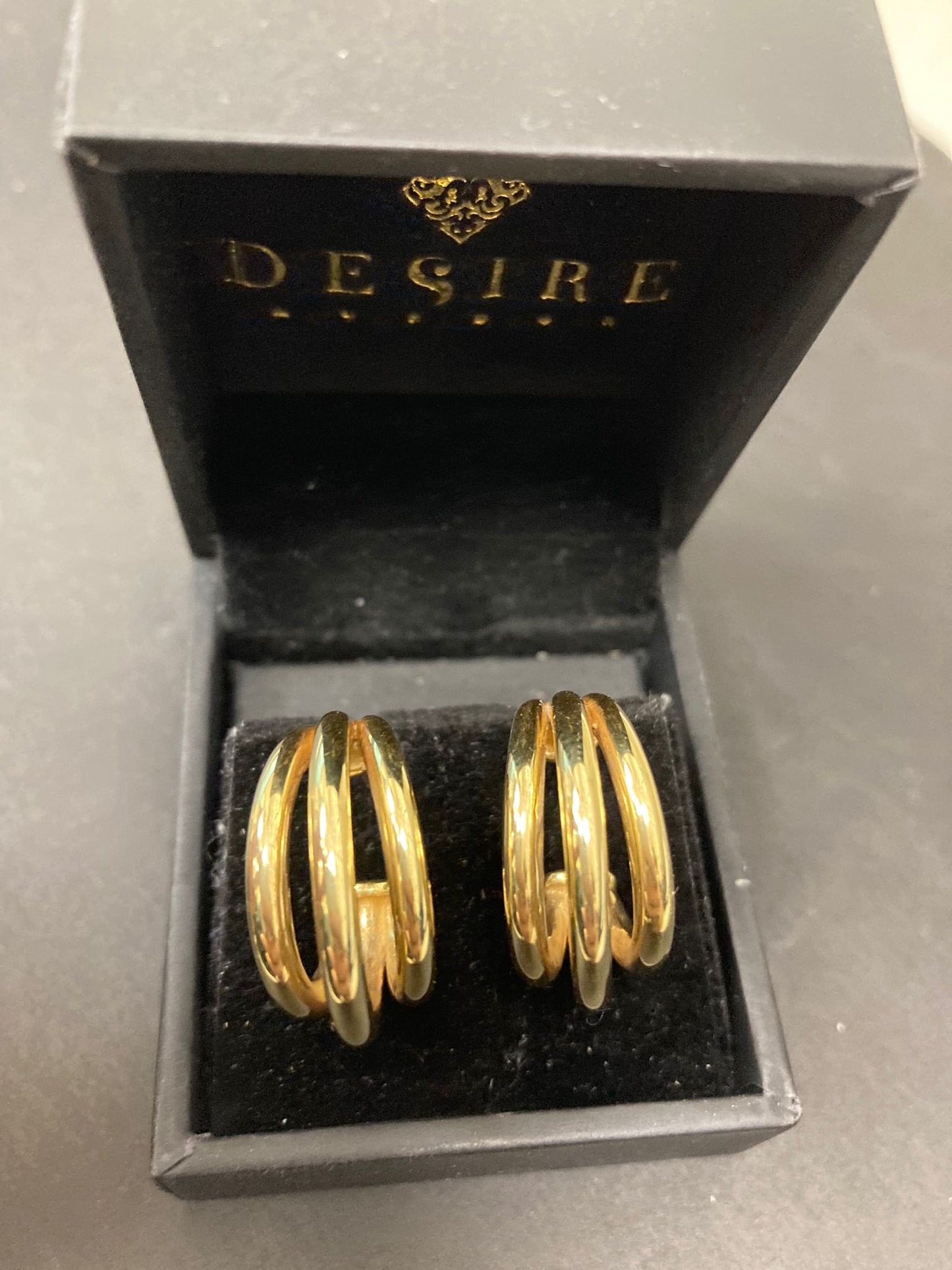 Sterling Silver Triple Hoop Earrings EP100119S displayed in a Desire box, featuring a polished and elegant design.