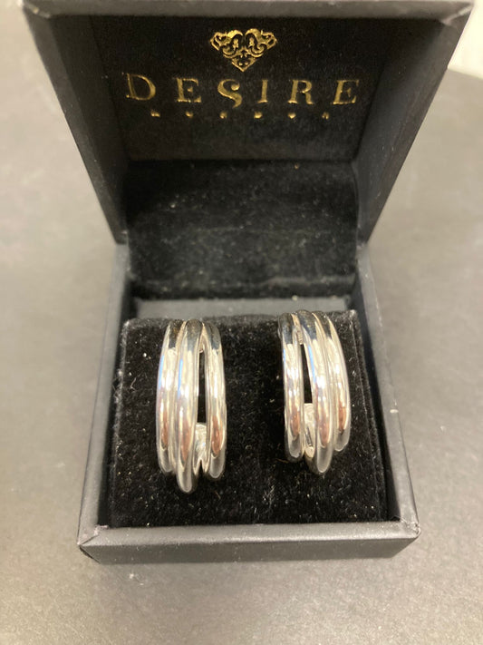 Sterling Silver Triple Hoop Earrings EP100119S displayed in a jewelry box.