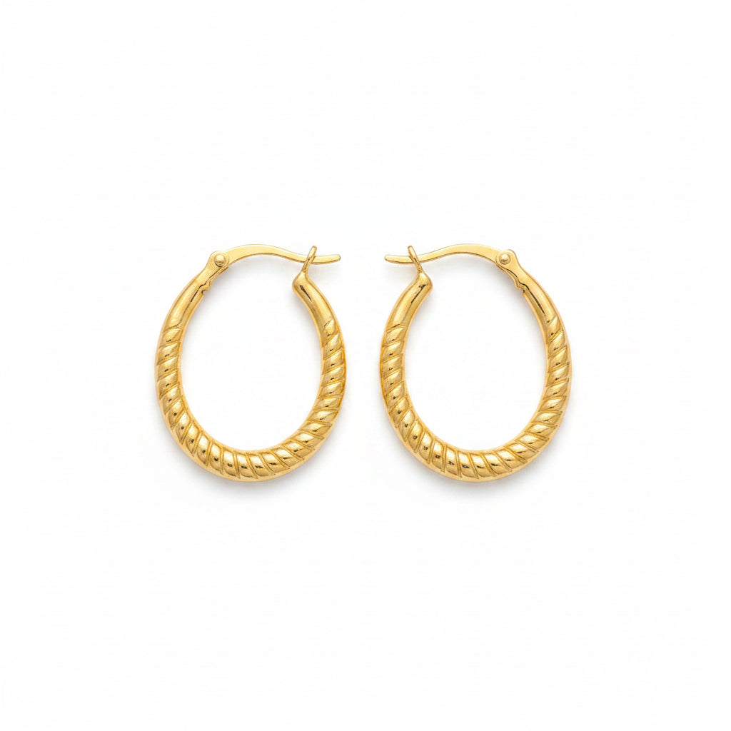 Stylish gold hoop earrings, perfect for any occasion, showcasing a beautiful twisted design.