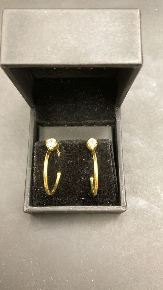 Sterling Silver Bezel CZ Huggies Hoop Stud Earrings displayed in a black jewelry box.