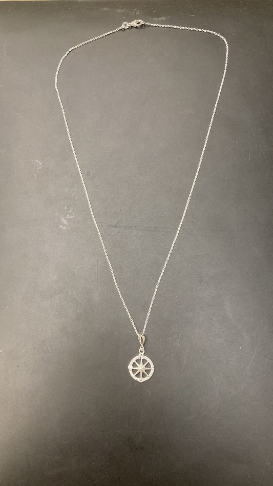 Sterling silver compass necklace NP10208 displayed on a black background.