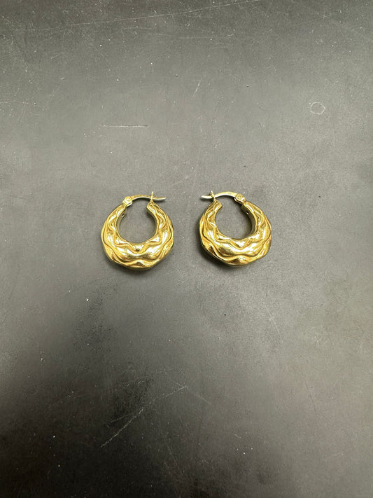 Sterling Silver Creole Hoop Earrings EP102457 displayed on a dark background, showcasing unique design.