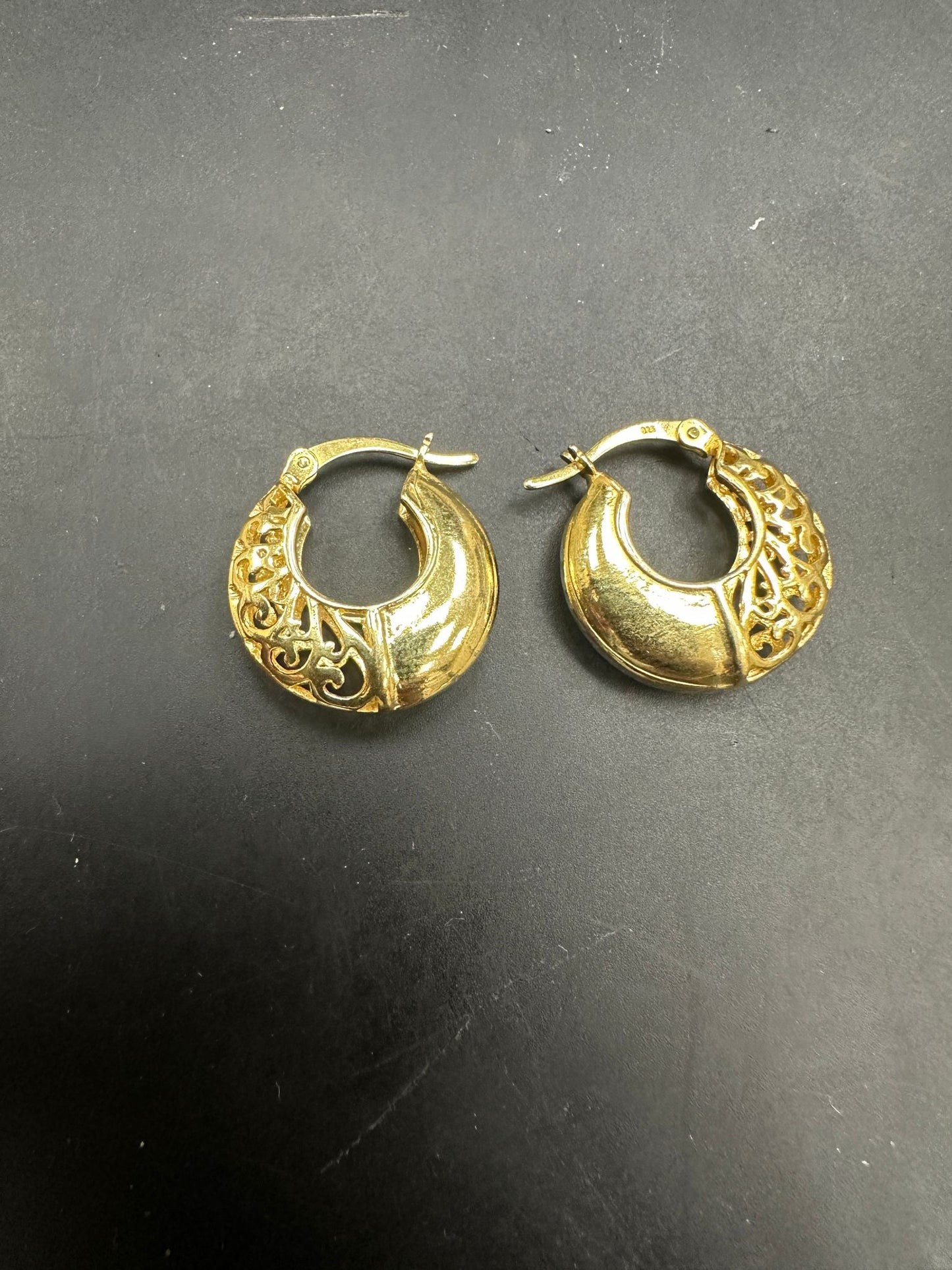 Sterling Silver Patterned Hoop Earrings EP10245 displaying intricate design and elegance, perfect for any occasion.