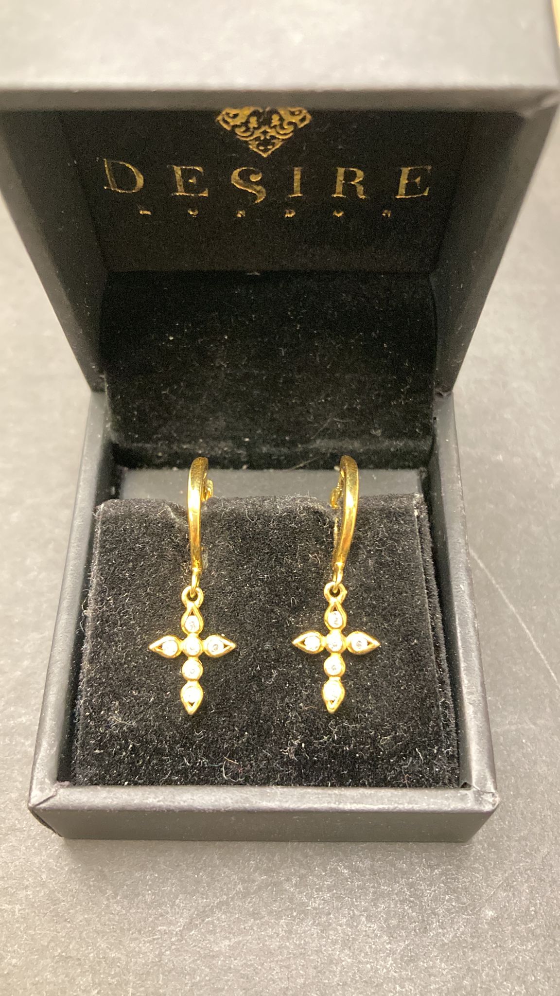 Sterling Silver Cz Cross Earrings displayed in a black jewelry box with a soft insert.