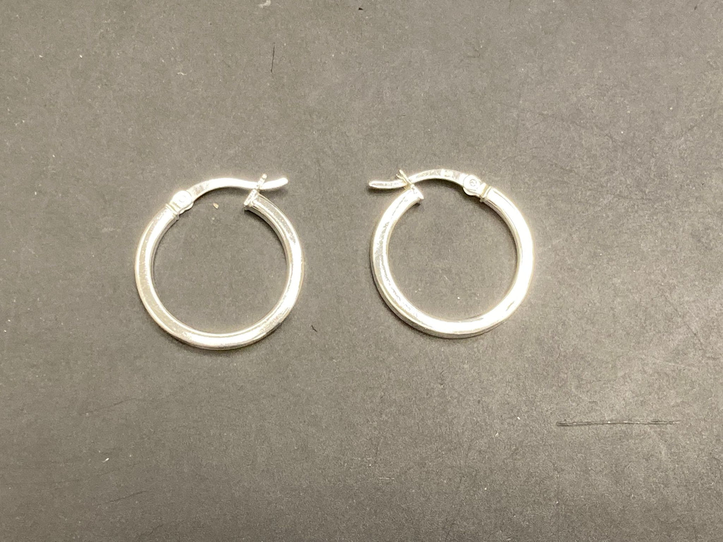 Sterling Silver Round Hoop Earrings EP10297, 2 MM thick, showcasing a pair of elegant hoops.