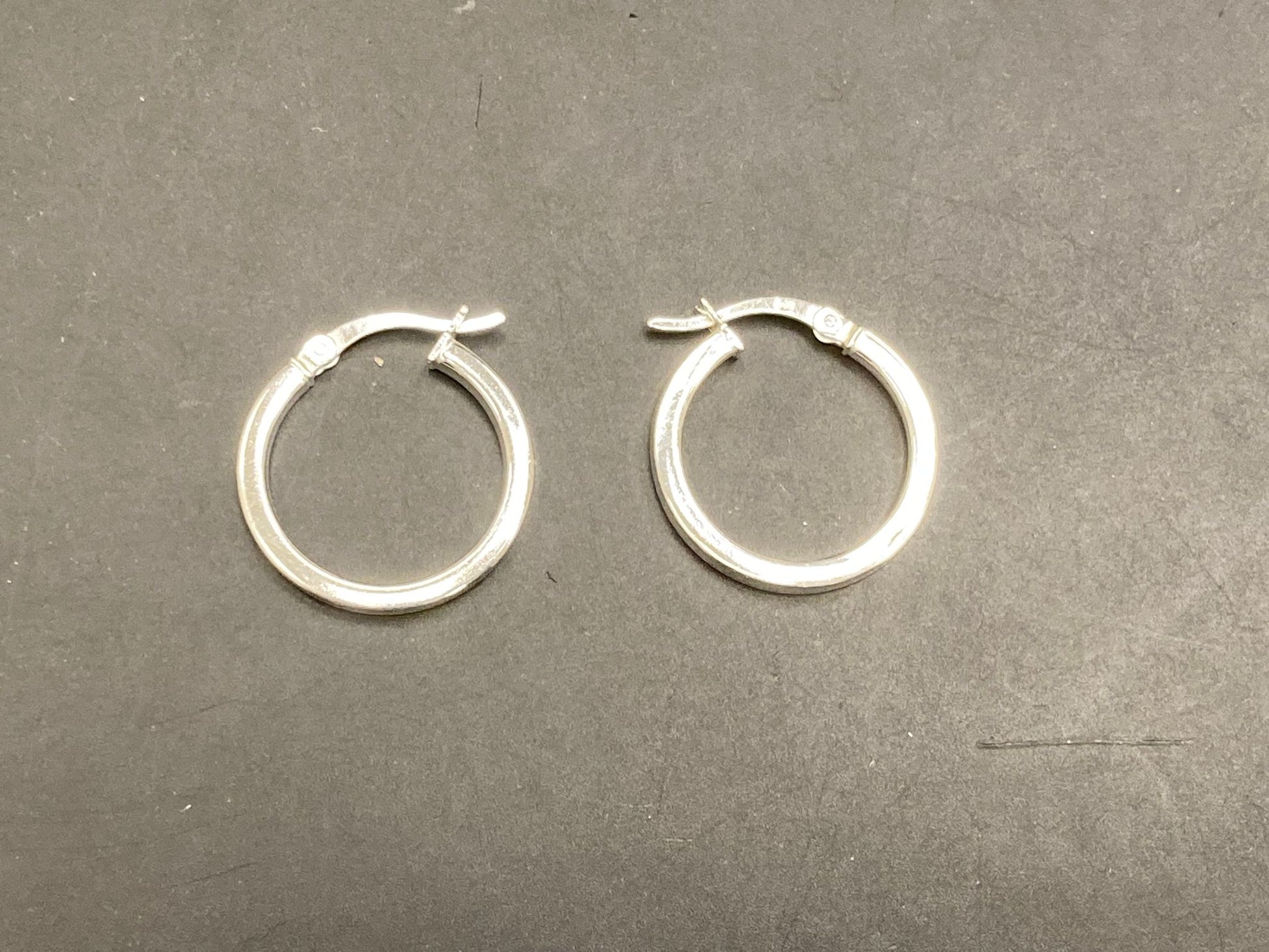 Sterling Silver Round Hoop Earrings EP10297, 2 MM thick, showcasing a pair of elegant hoops.
