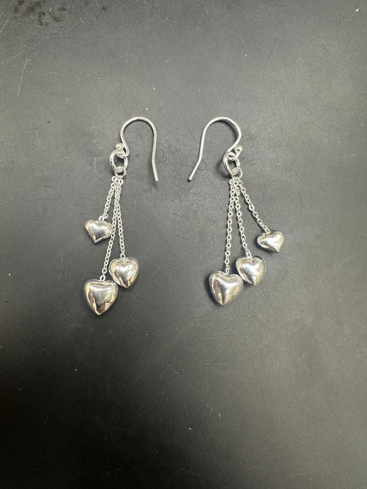 Sterling Silver Drop Earrings EP124 featuring heart charms on elegant chains.