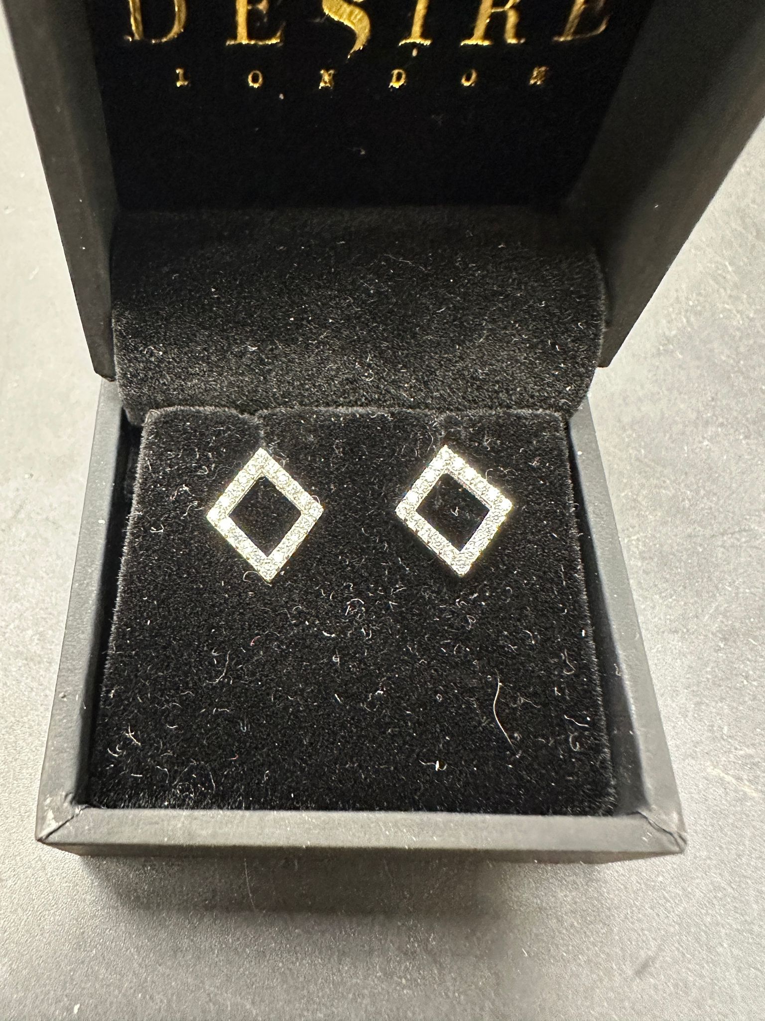 Sterling Silver Open Square Cz Stud Earring EP917 displayed in a box, sterling silver cz stud earrings.