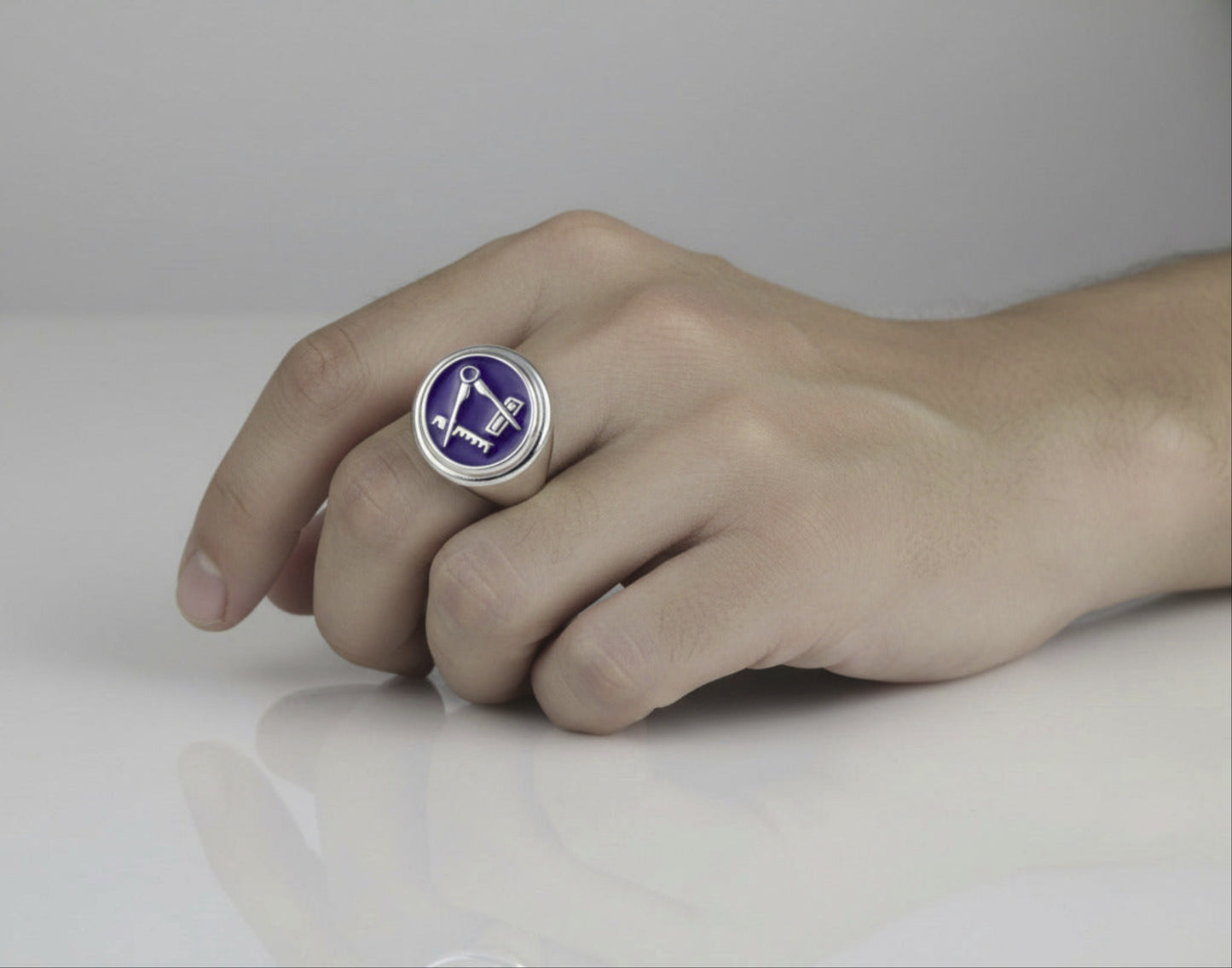 Silver ring with blue Masonic symbol 