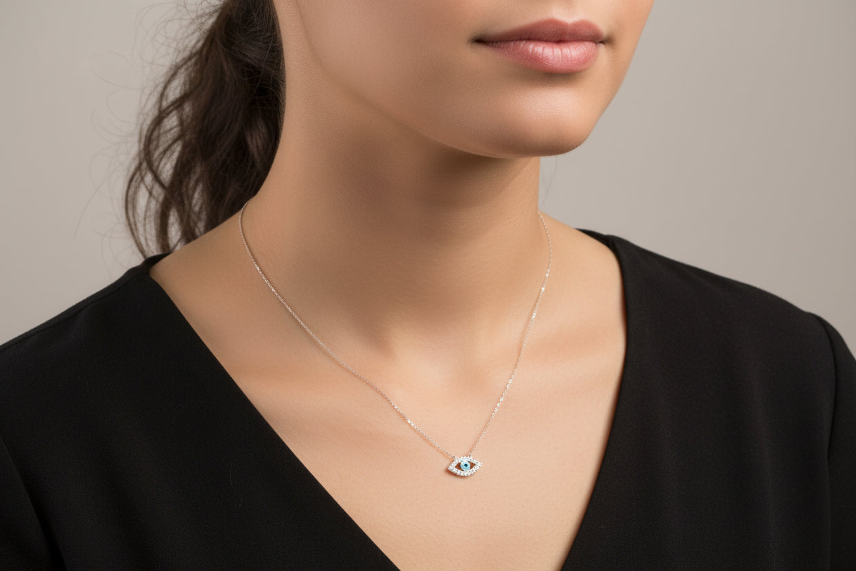 Sterling silver cz evil eye necklace worn by a model, showcasing its elegant design and charm.