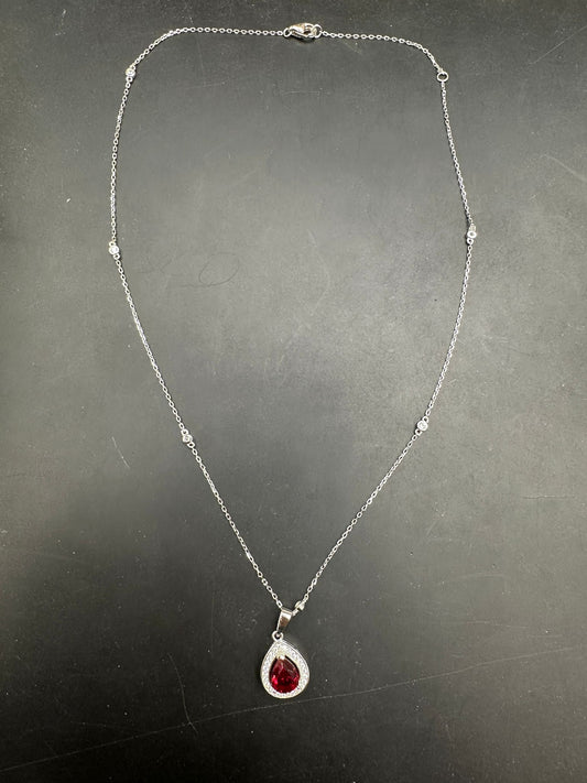 Sterling Silver Cz Pear Shape Necklace NCZ019 showcasing a beautiful pear shape cz necklace with a red pendant.