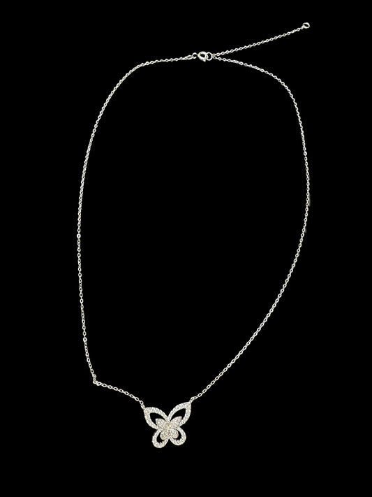 Sterling silver butterfly necklace NCZ1332 displayed on a black surface, showcasing intricate butterfly design.
