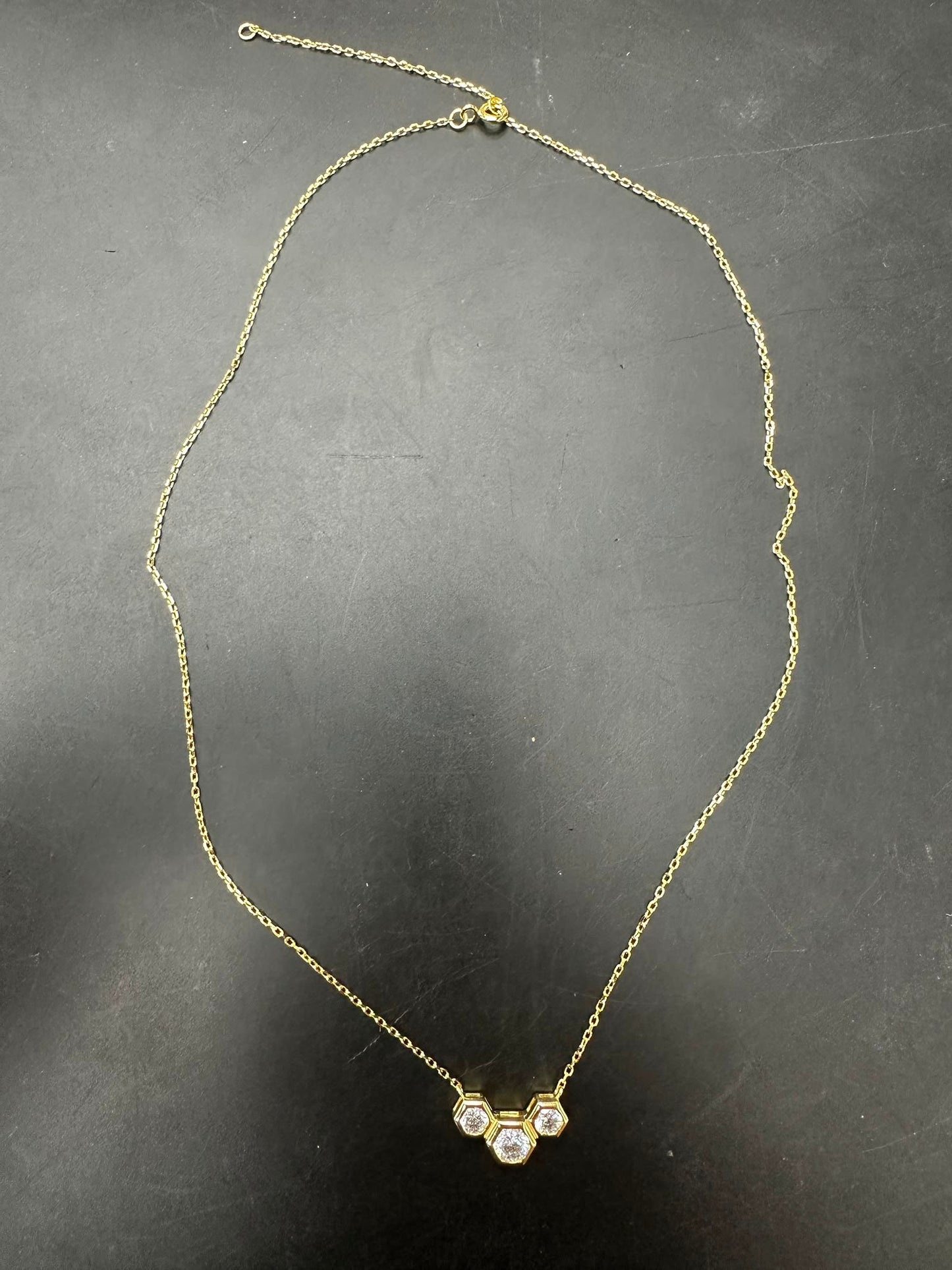Sterling silver cz stone necklace with gold plated design and sparkling cz stones.