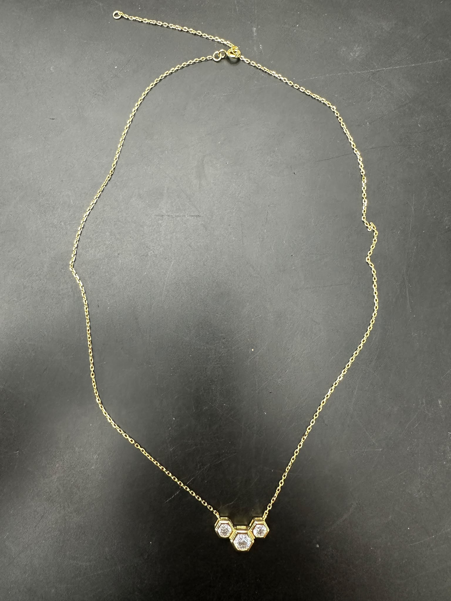 Sterling silver cz stone necklace with gold plated design and sparkling cz stones.