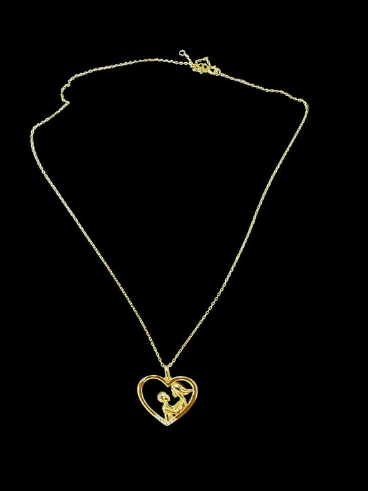 Sterling silver mother child necklace in gold plated heart design, ideal for gifts and special occasions.