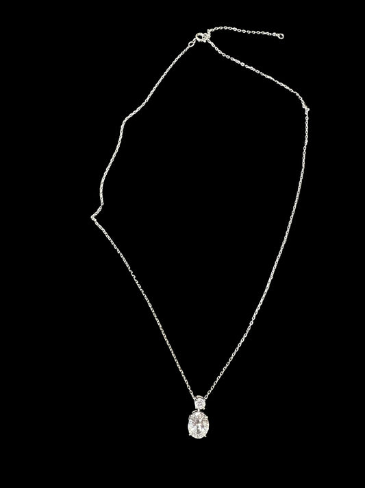 Sterling silver oval necklace featuring an 8*10mm oval stone and a 3.5mm round stone on a delicate chain.