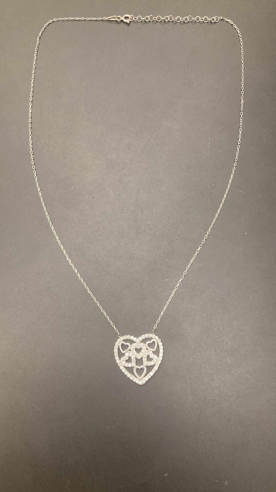 Sterling Silver Cz Heart Shaped Necklace NCZ9122 showcasing a beautiful sterling silver heart shaped necklace.
